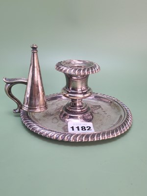 Lot 1182 - A chamber stick and snuffer, the Sheffield...