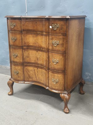 Lot 1188 - A 20th century walnut chest of four inverted...