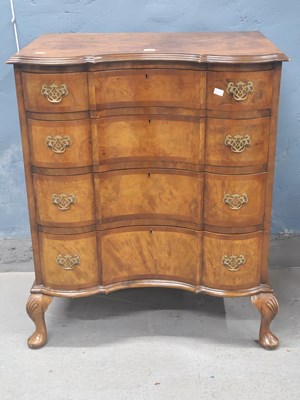 Lot 1188 - A 20th century walnut chest of four inverted...