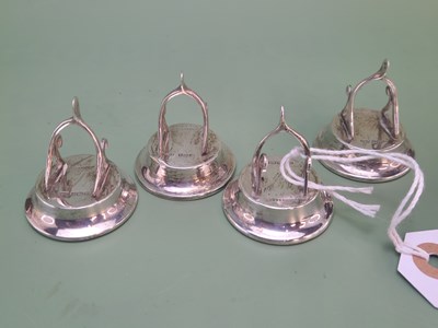 Lot 1022 - A set of four Edward VII silver wishbone form...
