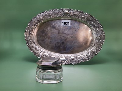 Lot 1031 - An 800 silver oval dish, the rim with swags of...