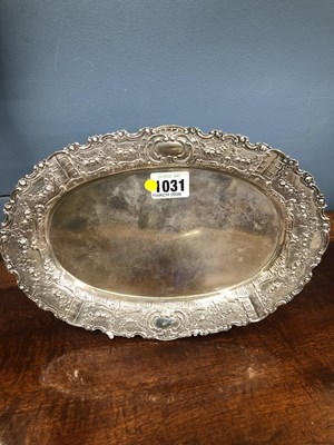 Lot 1031 - An 800 silver oval dish, the rim with swags of...