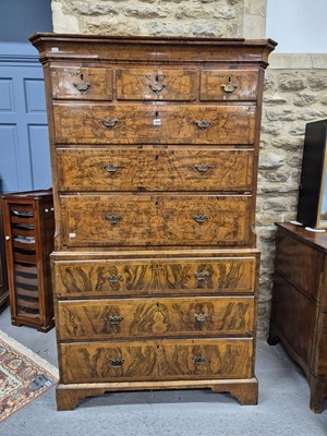 Lot 1039 - A mid 18th century cross banded walnut chest...