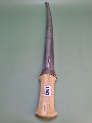 Lot 1043 - An Ottoman dagger in a metal scabbard, the...