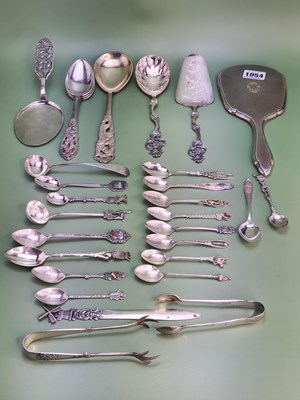 Lot 1054 - A Chester silver backed hand mirror, a cream...