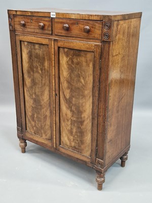 Lot 1058 - A 19th century mahogany credenza with two...