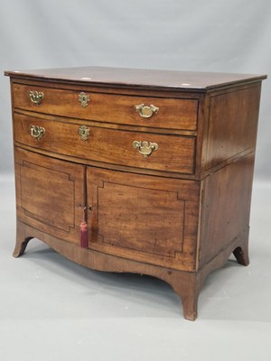 Lot 1060 - A 19th century mahogany bow front chest of two...