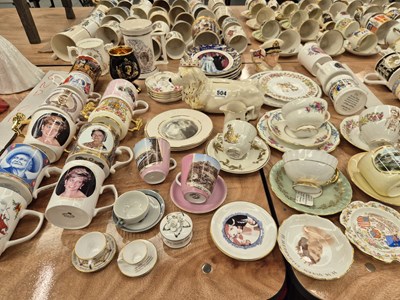 Lot 504 - A crowned corgi pottery money box, royal...