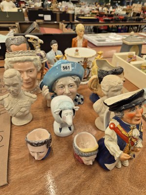 Lot 561 - A collection of royal character jugs, busts,...