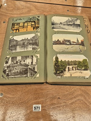Lot 571 - An album of early 20th century post cards:...