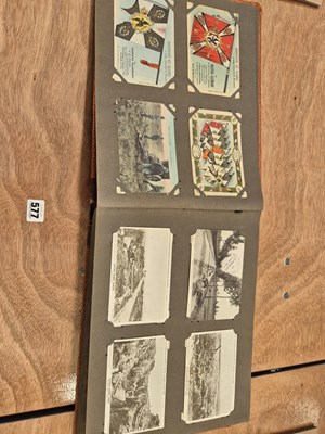 Lot 577 - An album of early 20th century post cards, WWI...