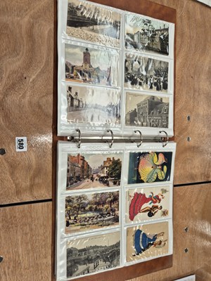Lot 580 - An album of early 20th century postcards: town...