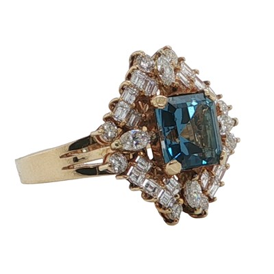 Lot 1095 - 18ct yellow gold blue topaz ring with...