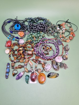 Lot 1103 - A collection of hardstone jewellery to include...