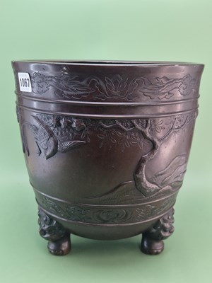 Lot 1067 - An early 20th century Japanese bronze planter,...