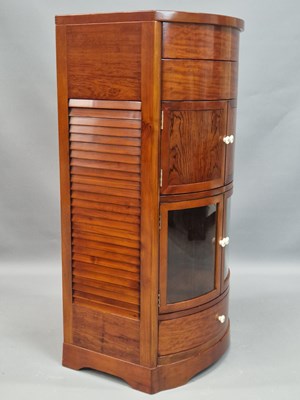 Lot 1088A - A Starbay hardwood bow front cabinet, the...