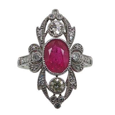 Lot 1130 - Platinum (950) fancy dress ring set with a...