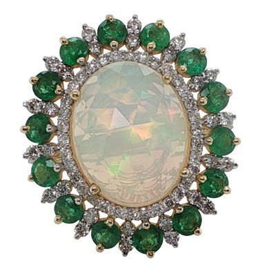 Lot 1132 - A 14ct yellow gold ring set with an oval opal...