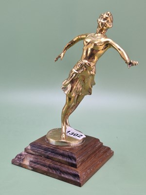 Lot 1302 - Schinko, an Art Deco polished bronze of a lady...