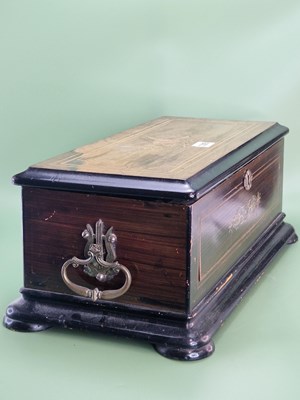 Lot 1305 - A Swiss music box playing eight airs on a 21cm...