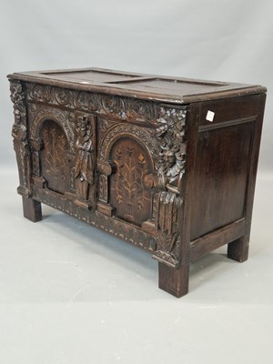 Lot 1312 - An early 18th century oak coffer, the two...