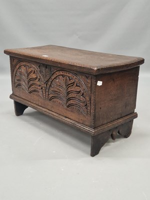 Lot 1316 - A 19th century oak coffer the two arched...
