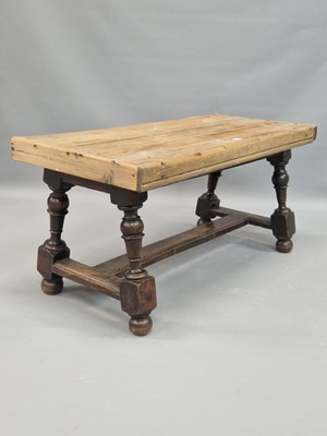 Lot 1320 - A pine topped oak coffee table, the baluster...