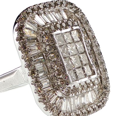Lot 1144 - A large 9ct white gold baguette cut and round...