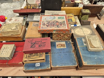 Lot 614 - A large collection of vintage boxed jigsaw...