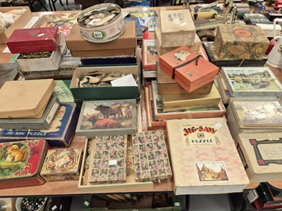 Lot 617 - A large collection of vintage boxed jigsaw...