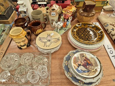 Lot 618 - Three cottage tea pots, decorative plates,...