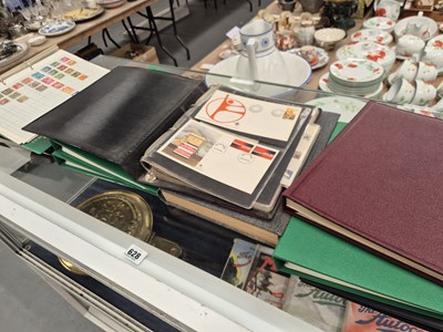 Lot 628 - A collection of stamps and first day cover albums