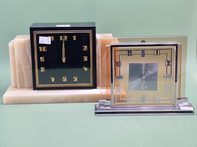 Lot 1342 - A Garrard retailed Le Coultre pink glass and...