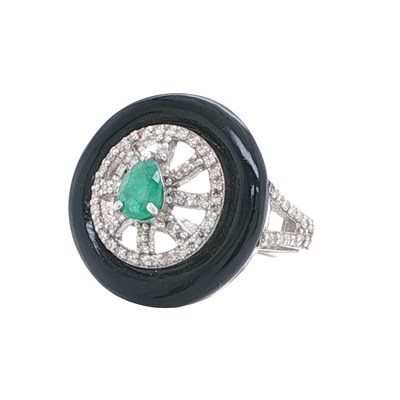 Lot 1148 - A silver black and onyx, diamond and pear...