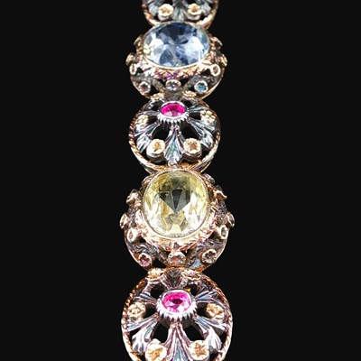 Lot 1155 - A mid-19th-century sapphire and ruby bracelet....