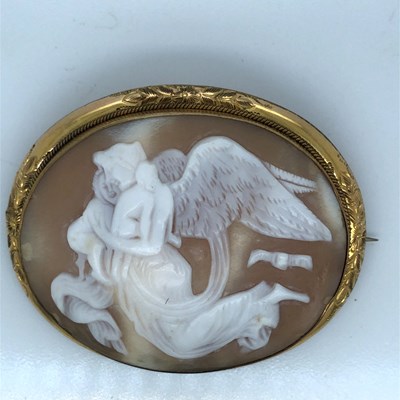 Lot 1167 - A large oval cameo brooch carved with Nyx, the...