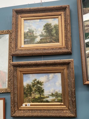 Lot 33 - A pair of gilt-framed oil paintings, river views