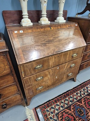 Lot 40 - A Georgian mahogany and crossbanded bureau H...
