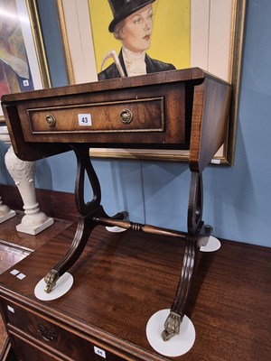 Lot 43 - A small sofa table form occasional table by...