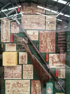 Lot 51 - A sporting gun display and a similar tennis...