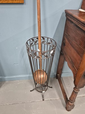 Lot 55 - A long-handled copper scoop and a wrought iron...