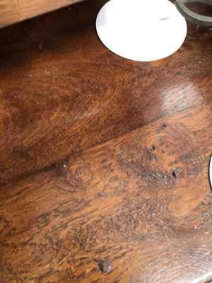 Lot 57 - A Georgian-style oak three-drawer dresser base...