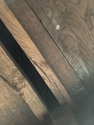 Lot 57 - A Georgian-style oak three-drawer dresser base...