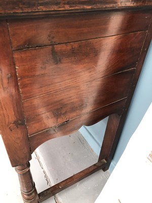 Lot 57 - A Georgian-style oak three-drawer dresser base...