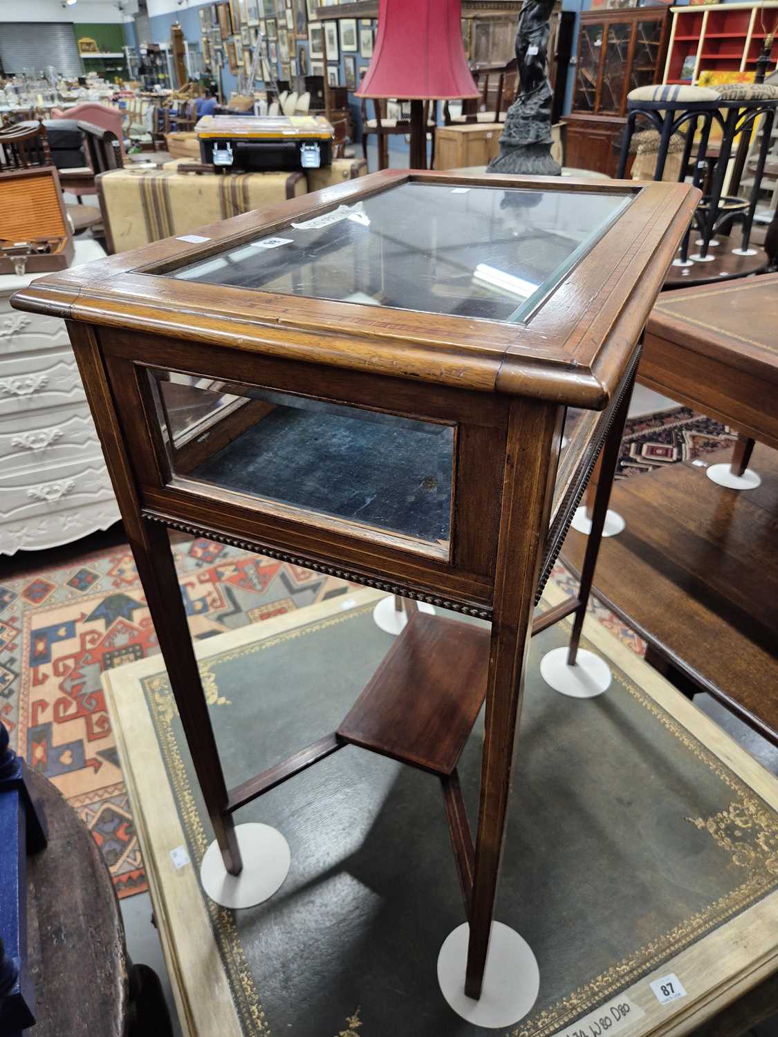 Lot 86 - A mahogany inlaid bijouterie table