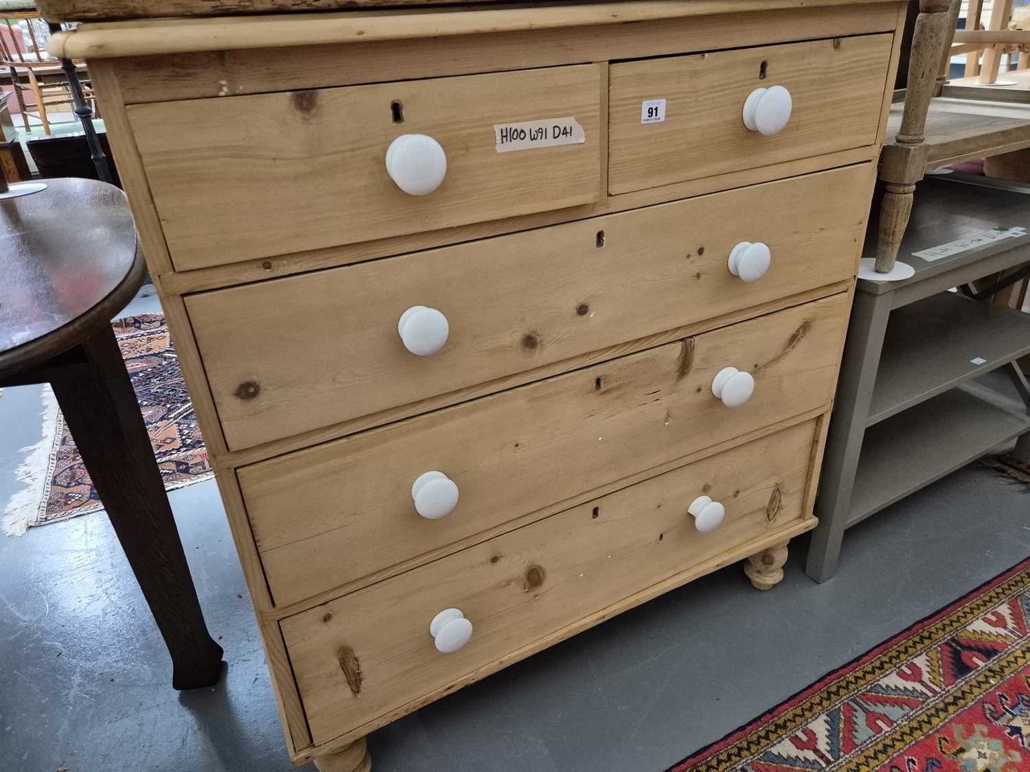 Lot 91 - An antique pine chest of five drawers H 100 W...