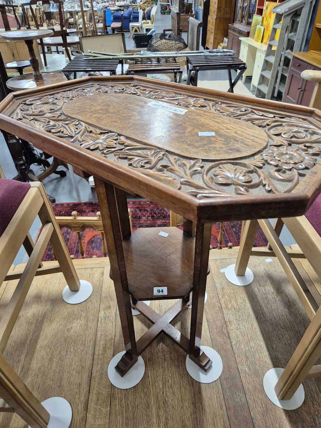 Lot 94 - A carved hardwood tray and a two-tier plant...