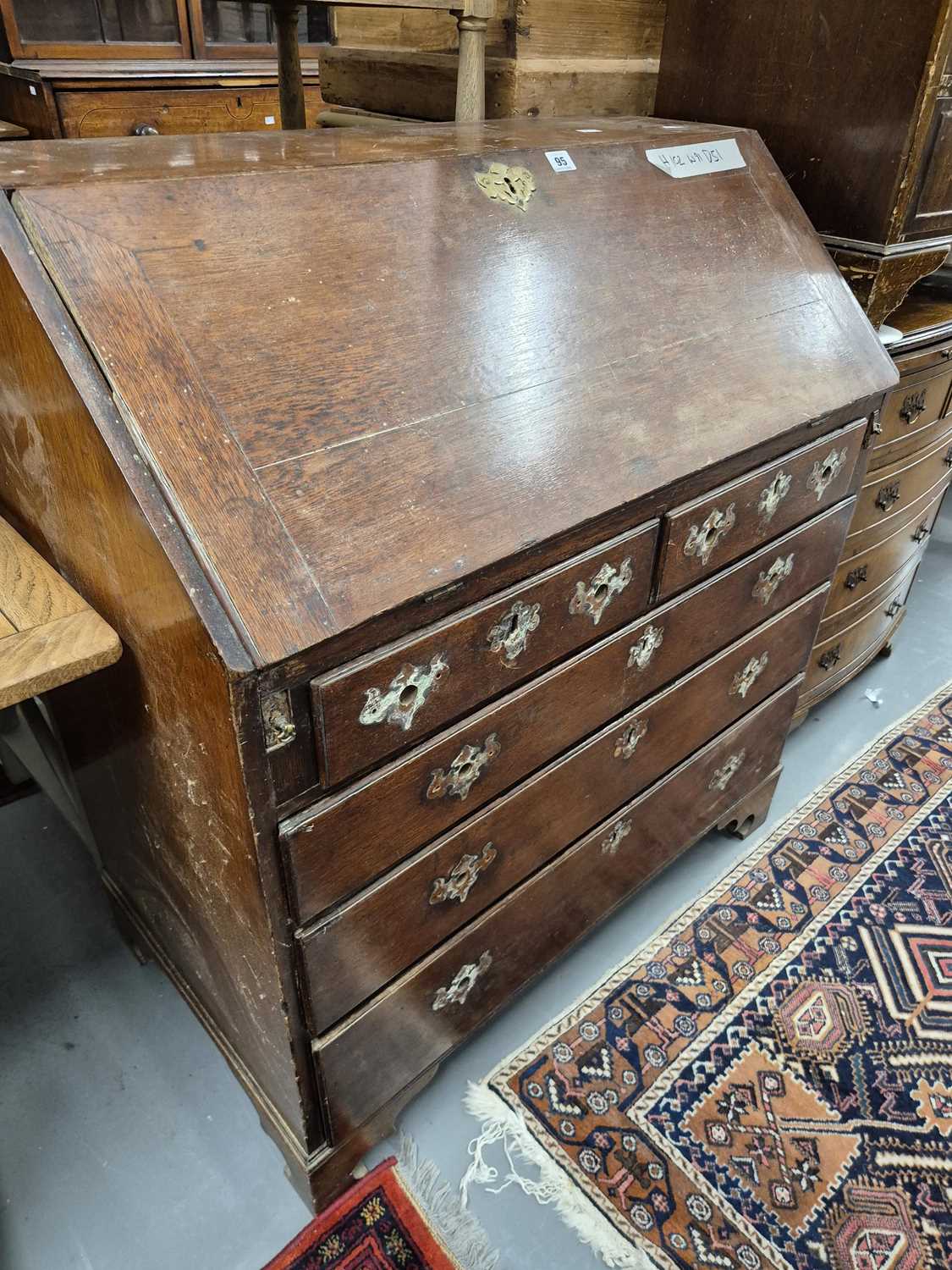 Lot 95 - A Georgian oak bureau H102 W 91 D 51cm
