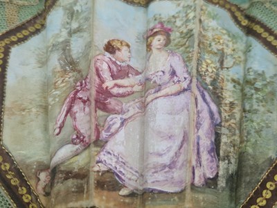 Lot 1347 - A Victorian fan with a paper floral swagged...