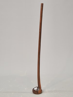 Lot 1355 - A lignum vitae club, the slender cylindrical...
